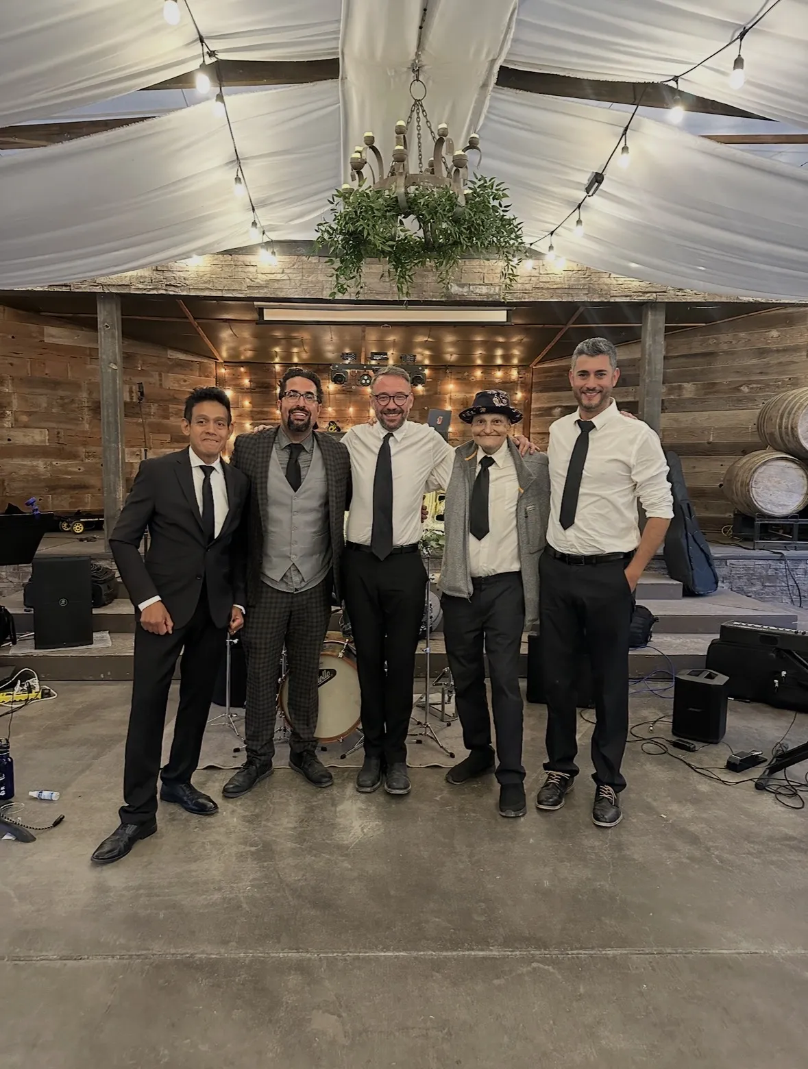 Live dance band performing energetically on stage